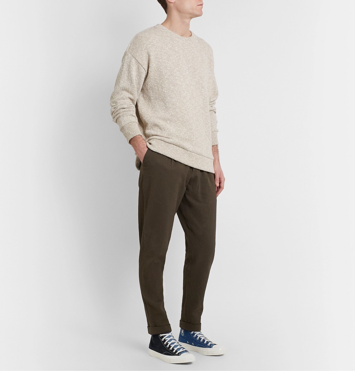 Universal Works - Tapered Pleated Cotton-Blend Seersucker Trousers ...