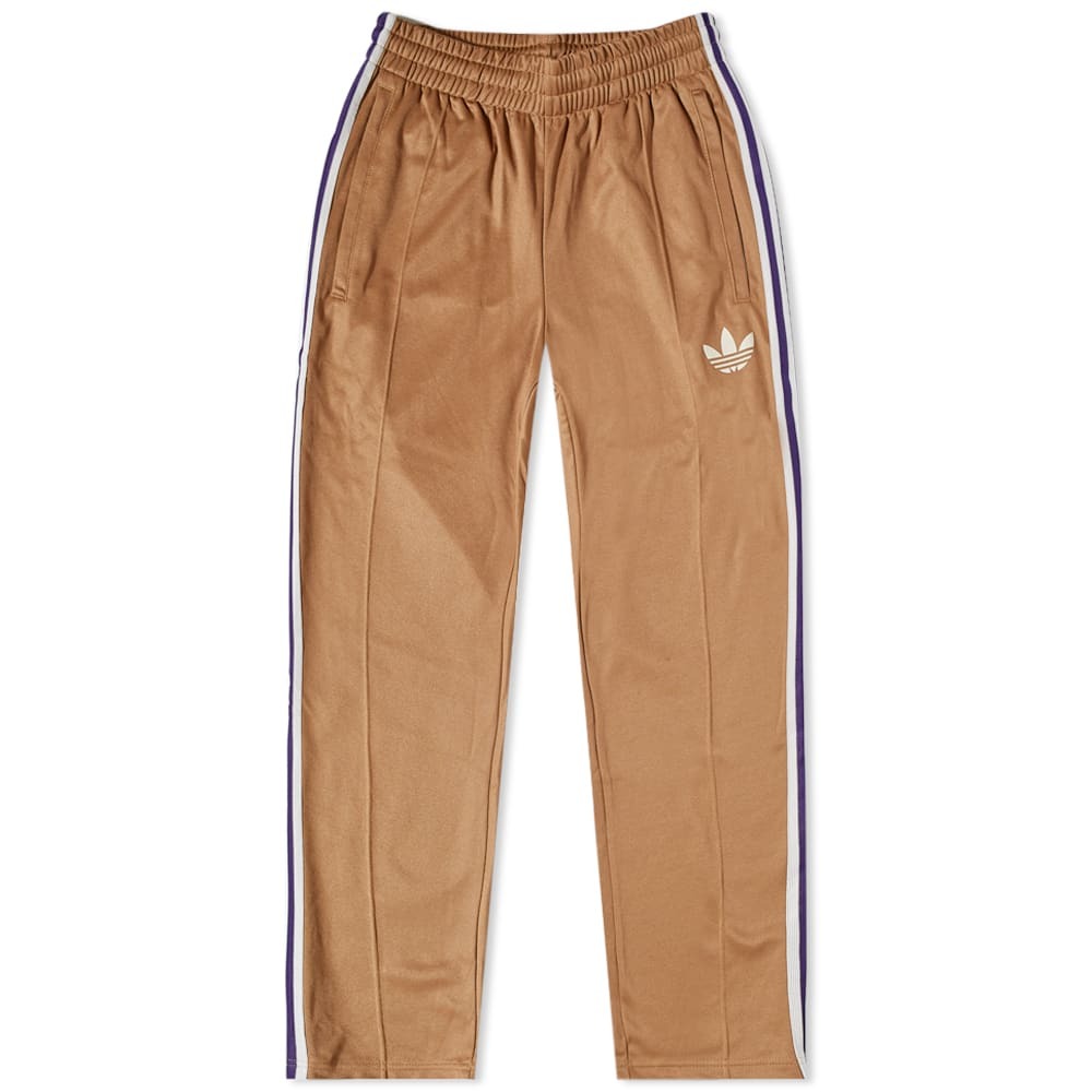 Photo: Adidas Men's Adicolor 70s Striped Track Pant in Brown Desert