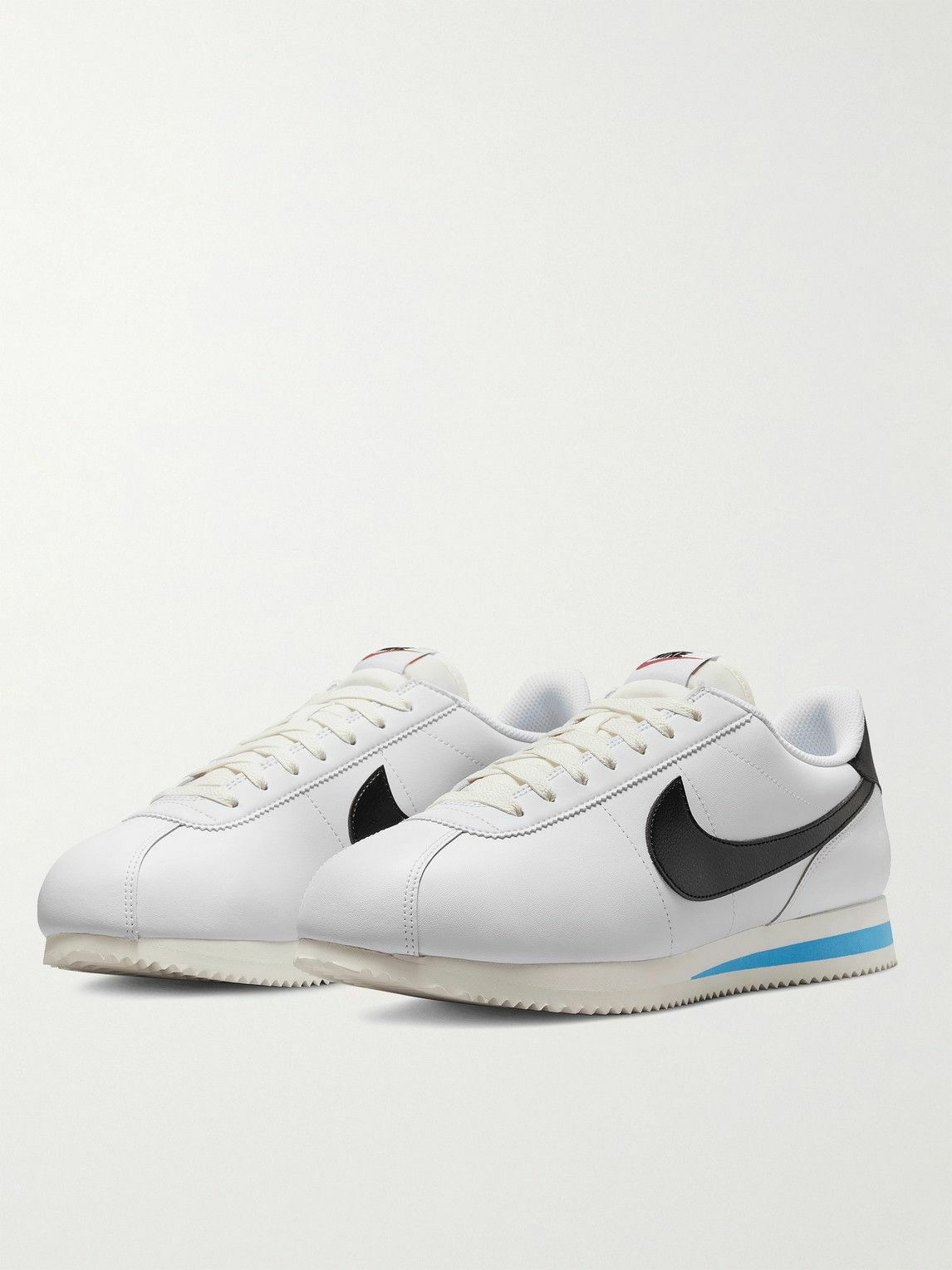 white on white nike cortez