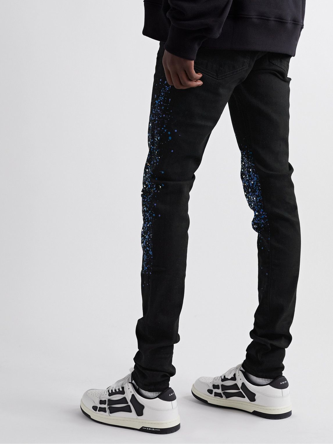 black amiri paint splatter jeans