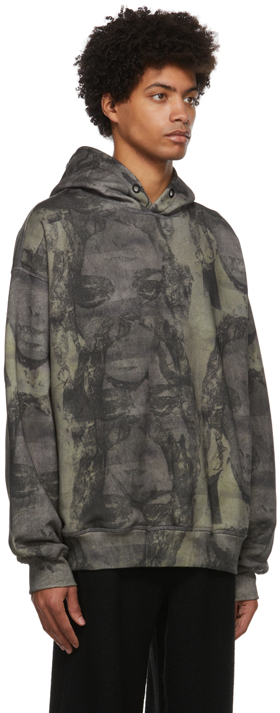black hoodie with green graphic