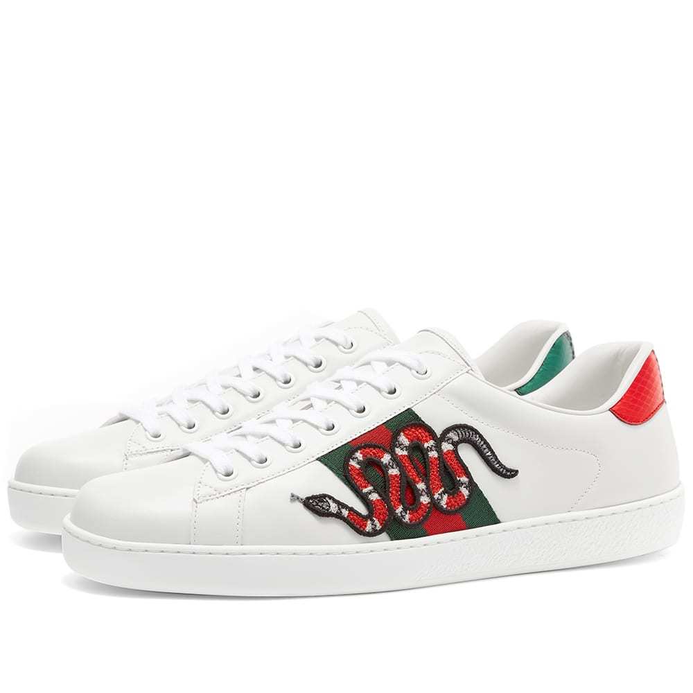 white gucci sneakers with snake