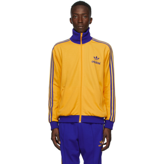 blue and yellow adidas track jacket