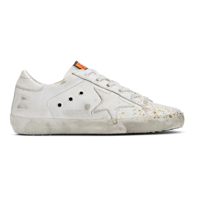 golden goose white and gold superstar sneakers