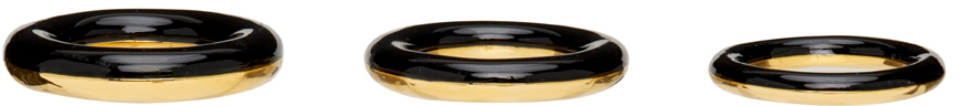 Photo: Charlotte Chesnais Gold & Black Brahma Ring Set