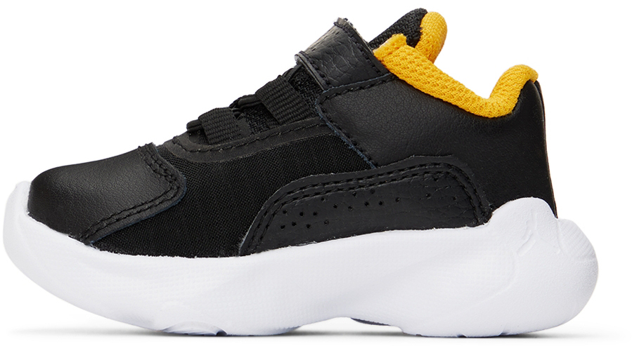 black and yellow jordans 11