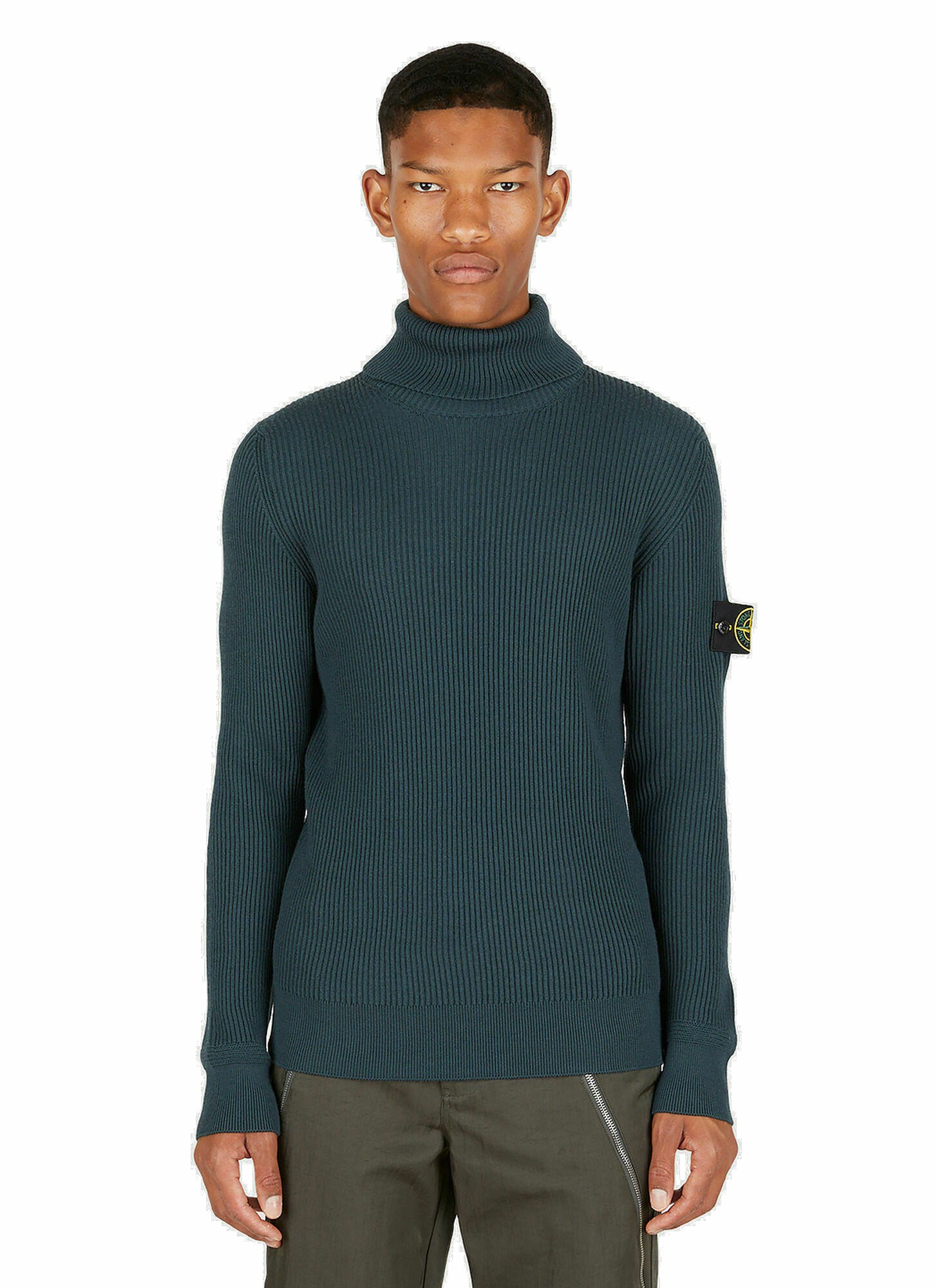 Photo: Roll Neck Compass Patch Sweater in Blue
