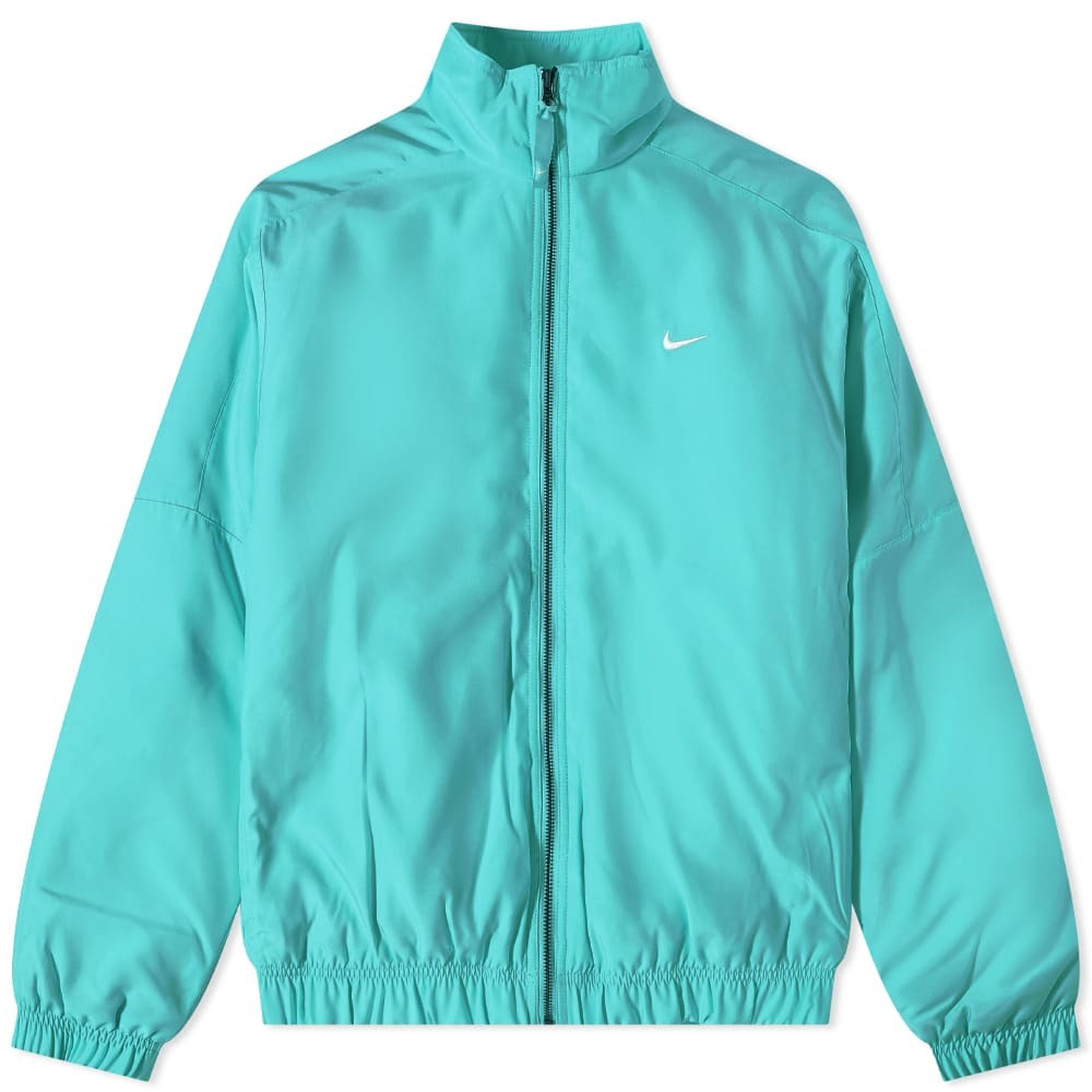 white nike shoes with teal swoosh