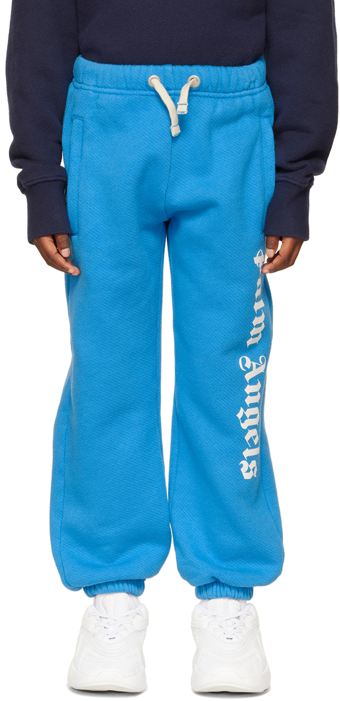 Photo: Palm Angels Kids Blue Logo Track Pants