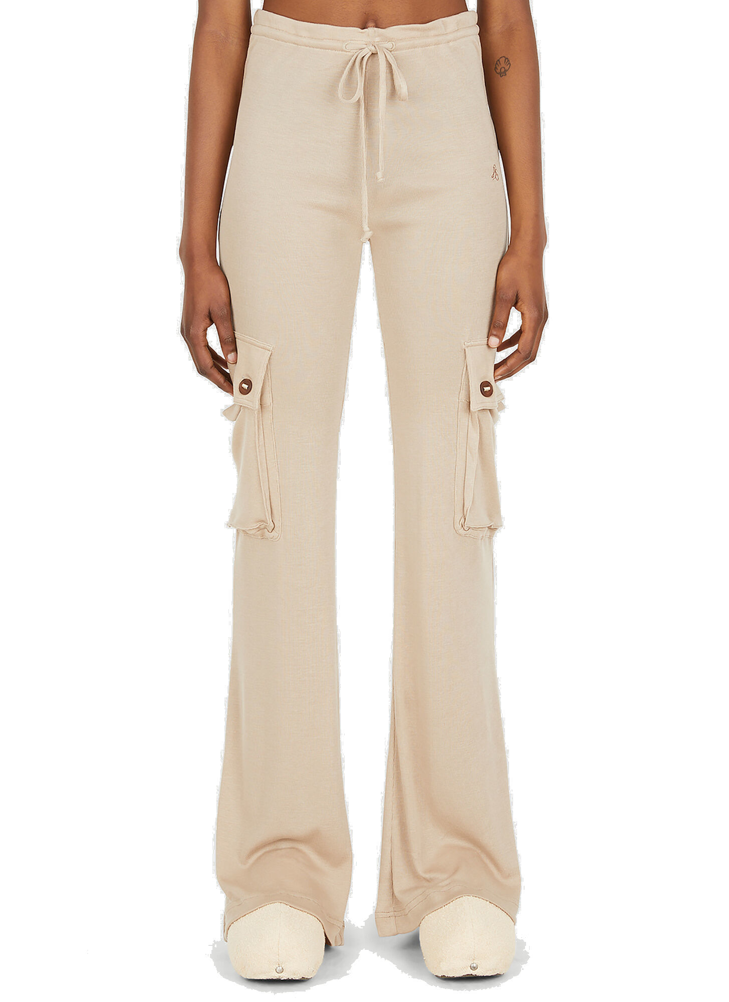 Photo: Flared Track Pants in Beige