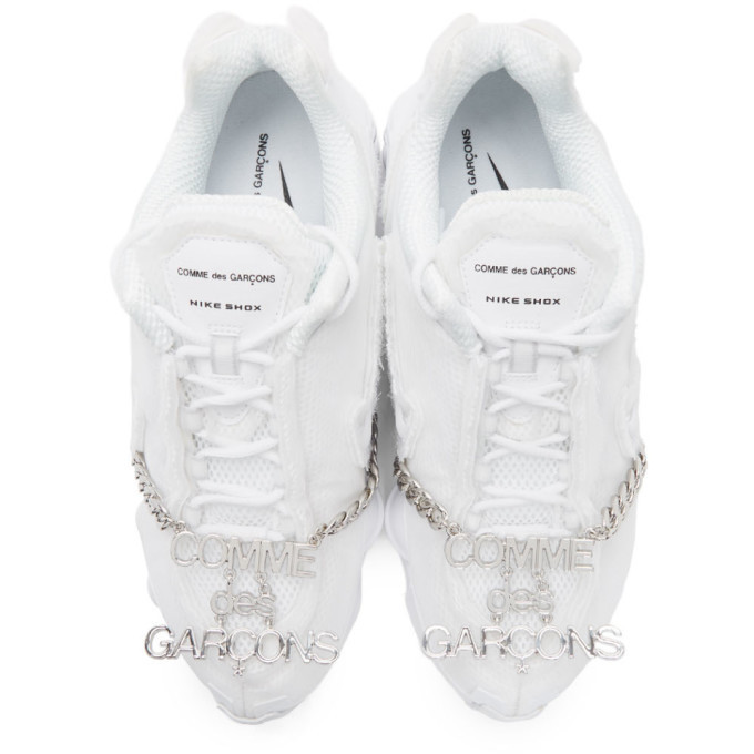 white nike edition cdg shox tl sneakers