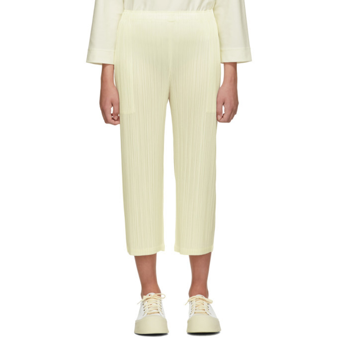 white pleated wide leg trousers