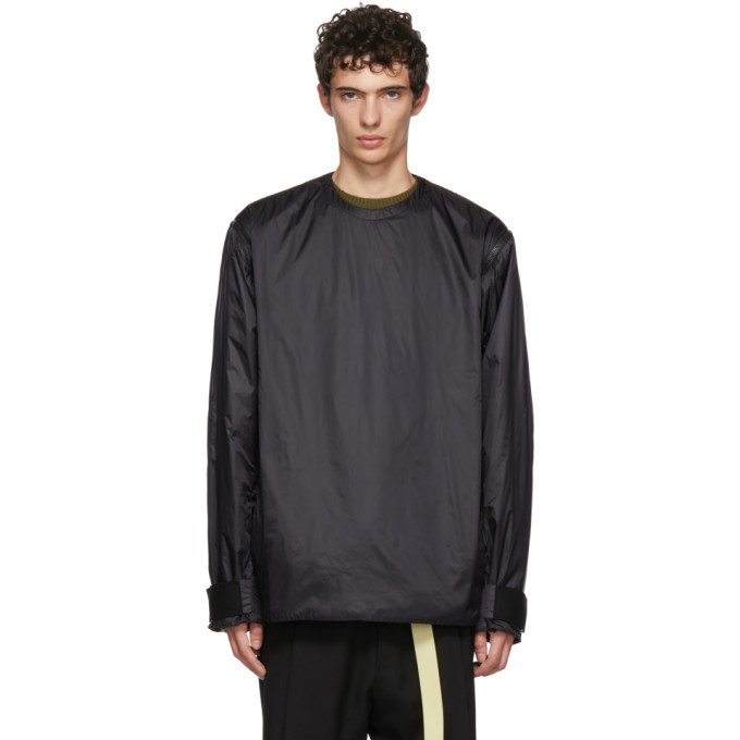 Photo: OAMC Black Transmission Zip-Off Sleeve Sweatshirt