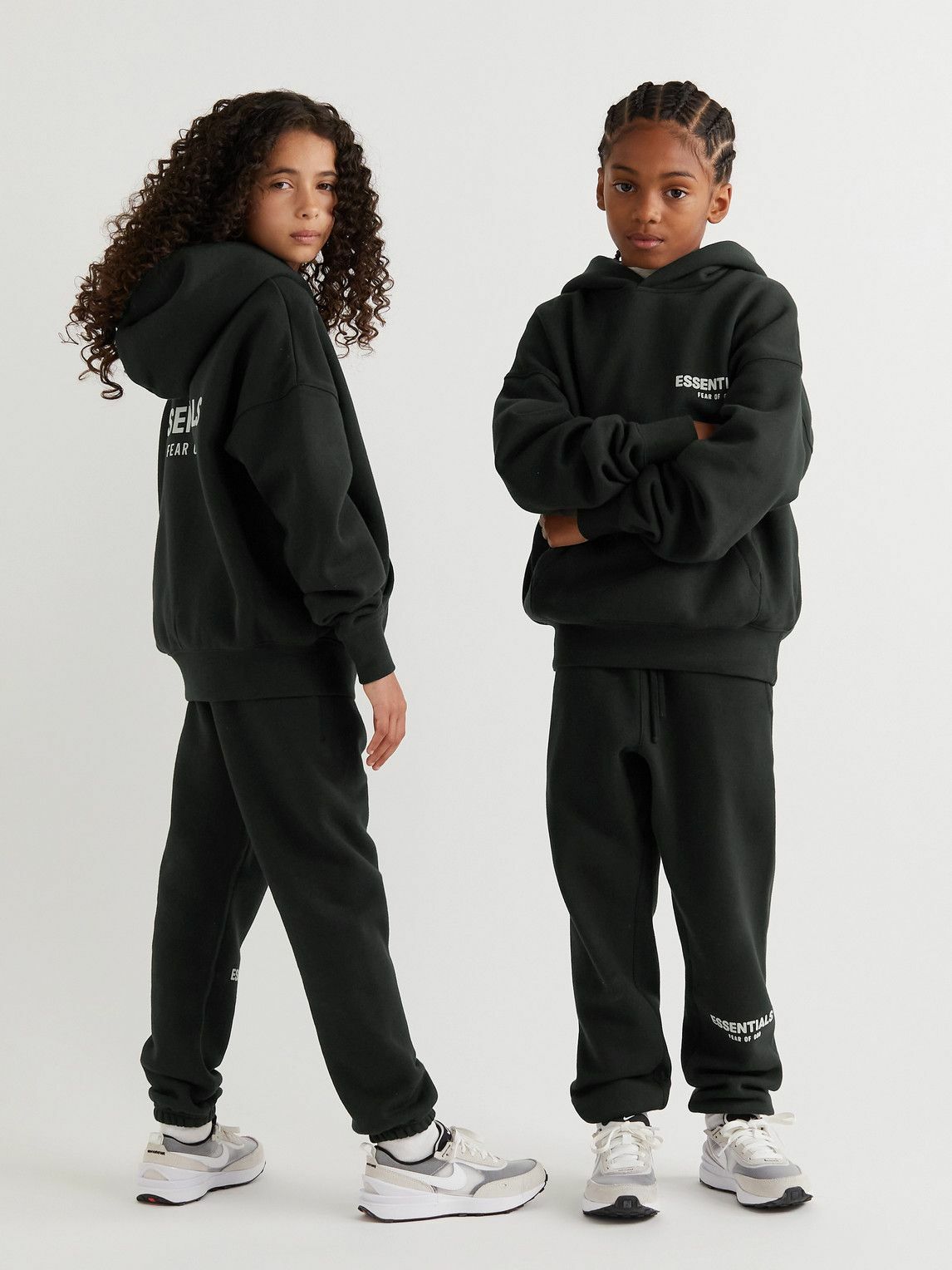 Photo: Fear of God Essentials Kids - Logo-Flocked Cotton-Blend Jersey Sweatpants - Black