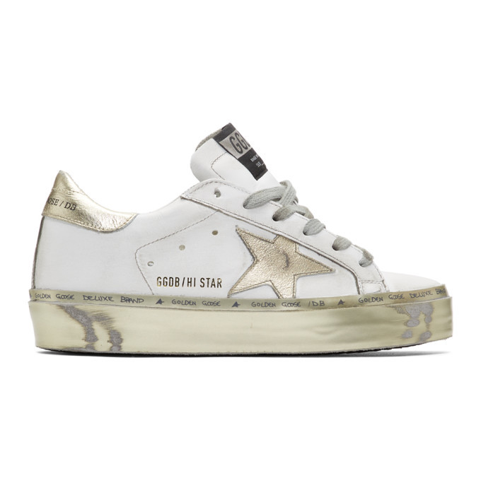 gold and white golden goose