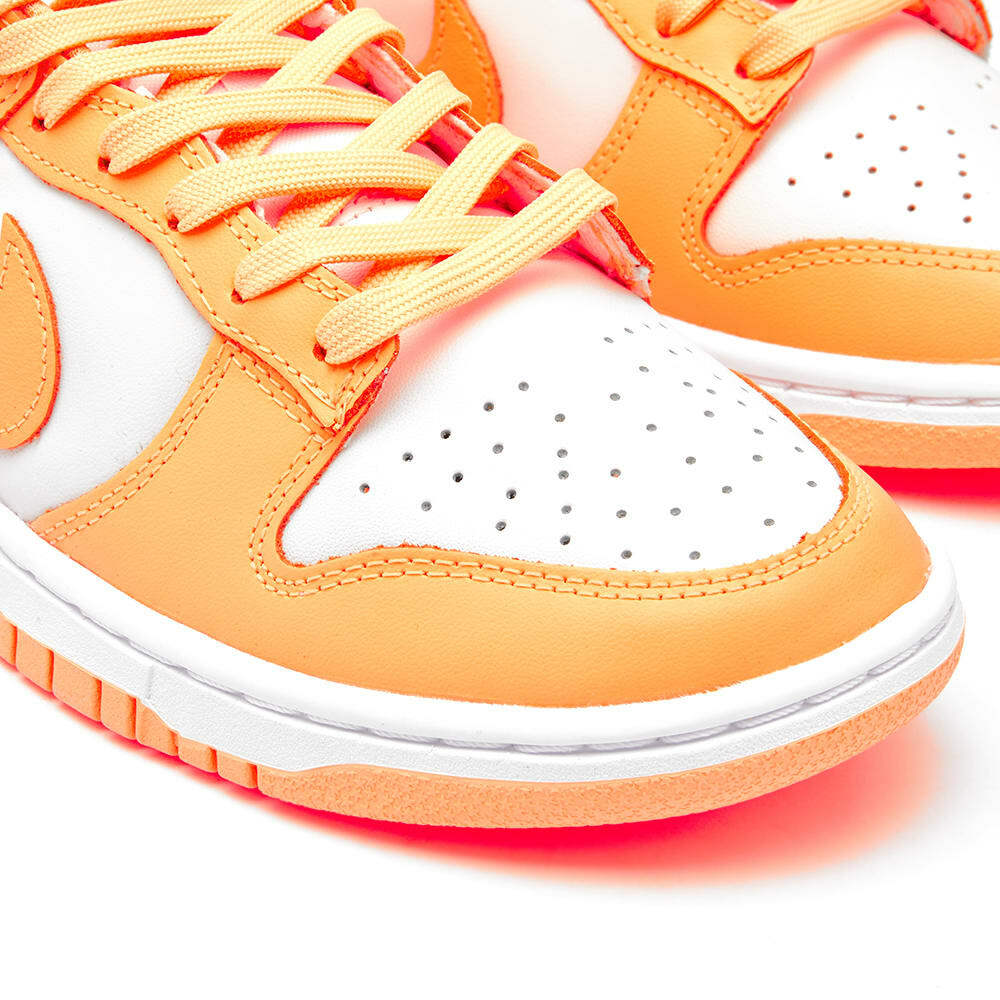 peach color nike shoes