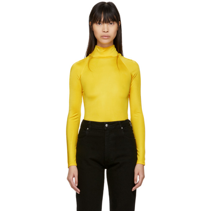 yellow turtleneck top