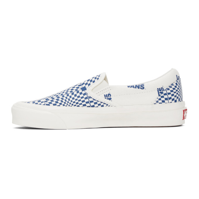 blue and white vans slip ons
