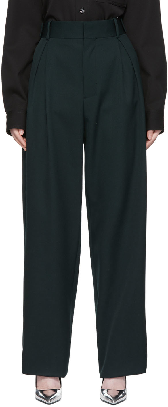 green tapered trousers