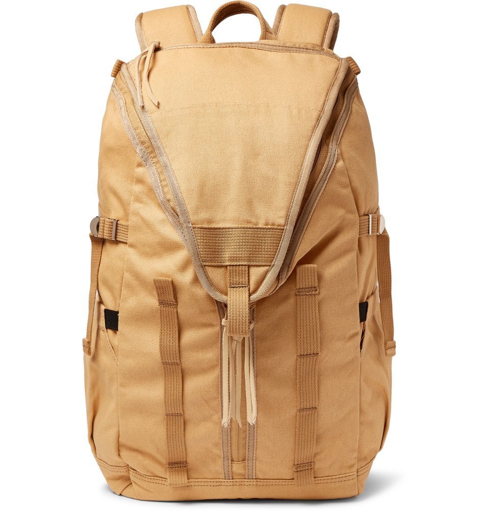 beige canvas backpack