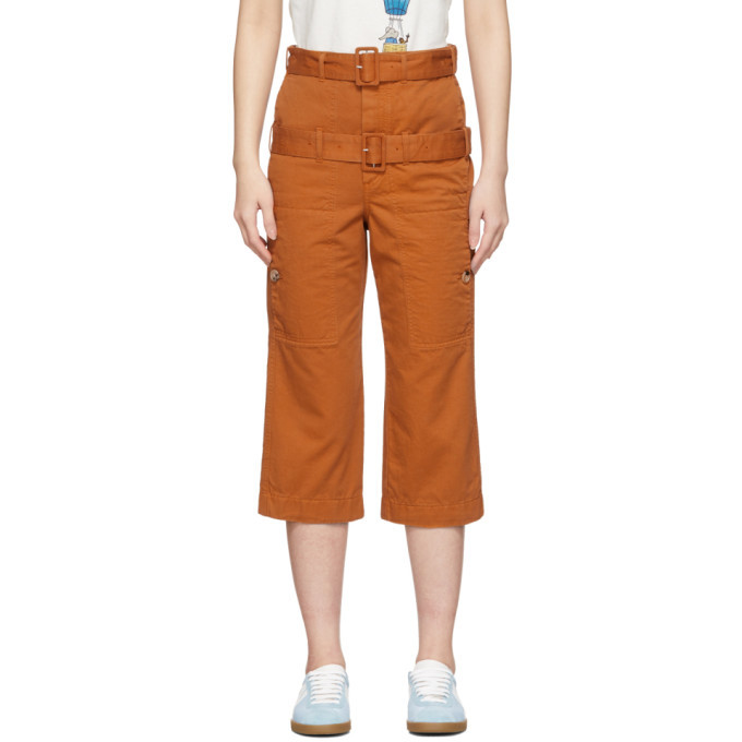 orange cropped trousers