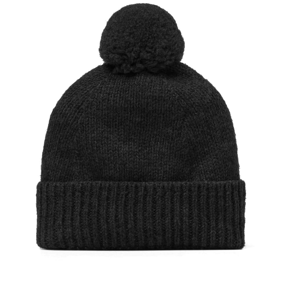 black wooly bobble hat