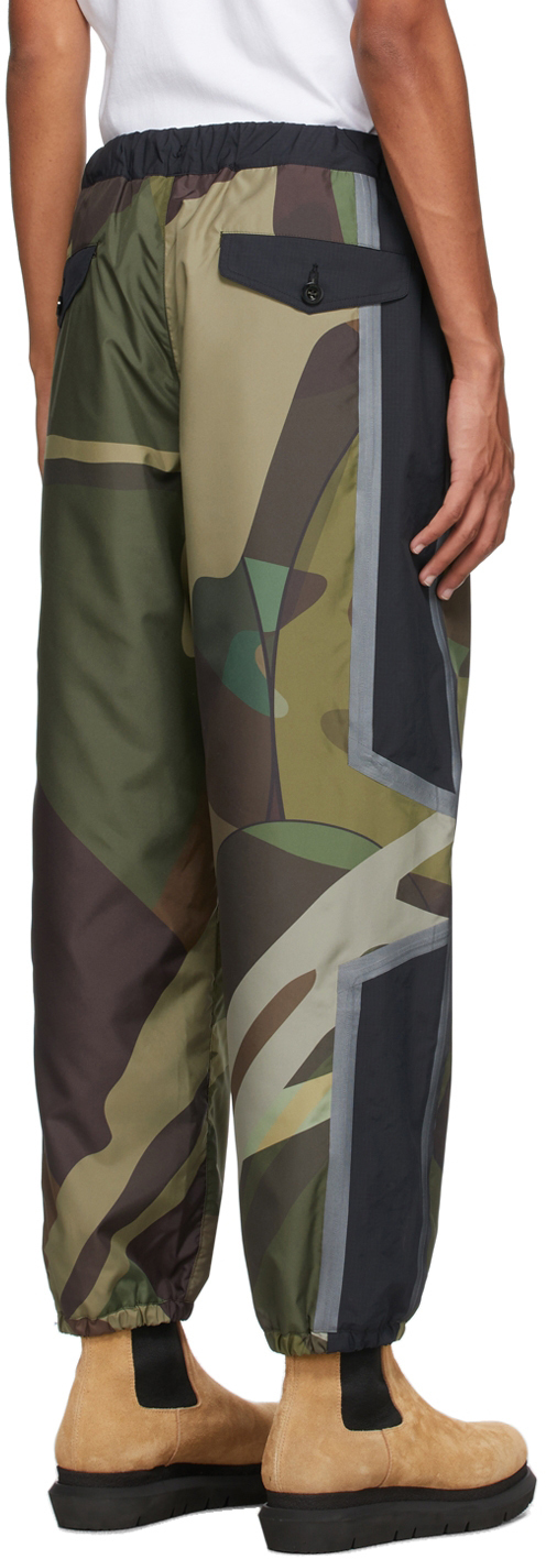 Sacai Green & Black KAWS Edition Camo Lounge Pants Sacai