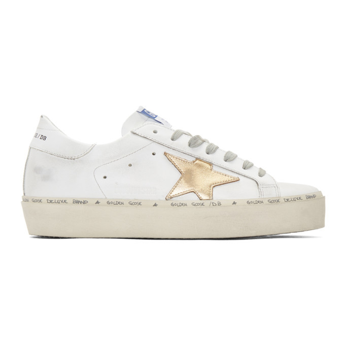golden goose white & gold hi star sneakers