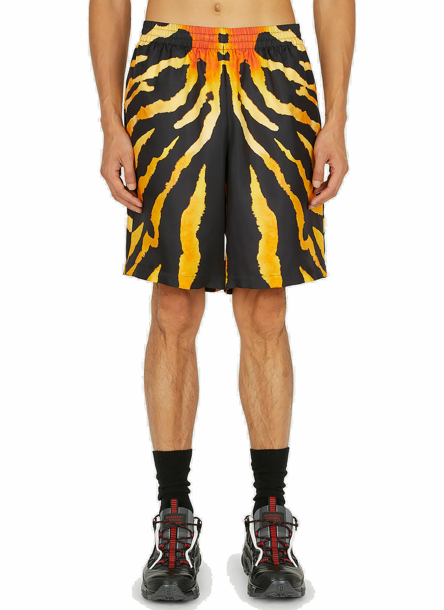 Photo: Tiger Print Shorts in Black And Yellow