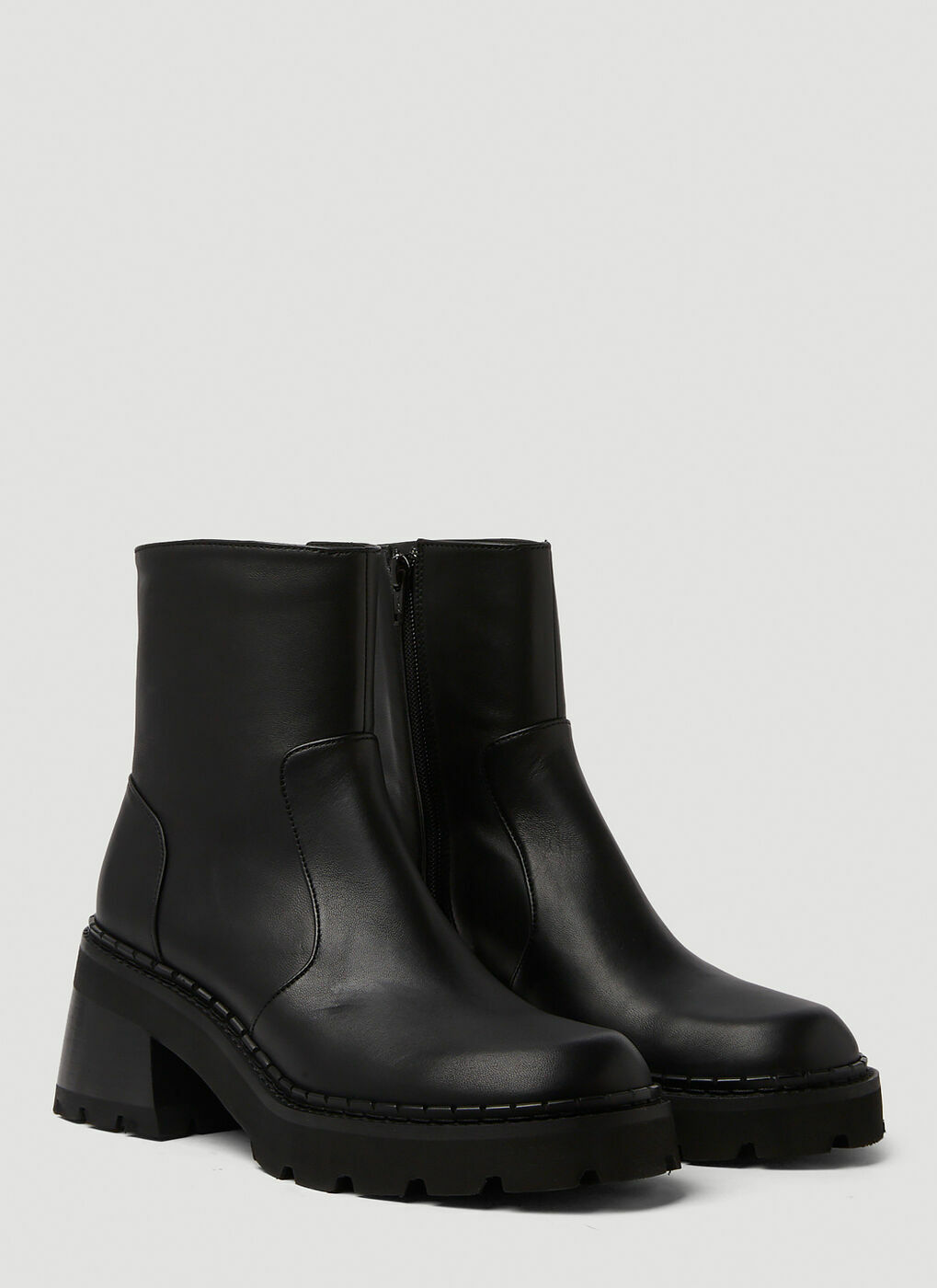 Norris Ankle Boots in Black By Far