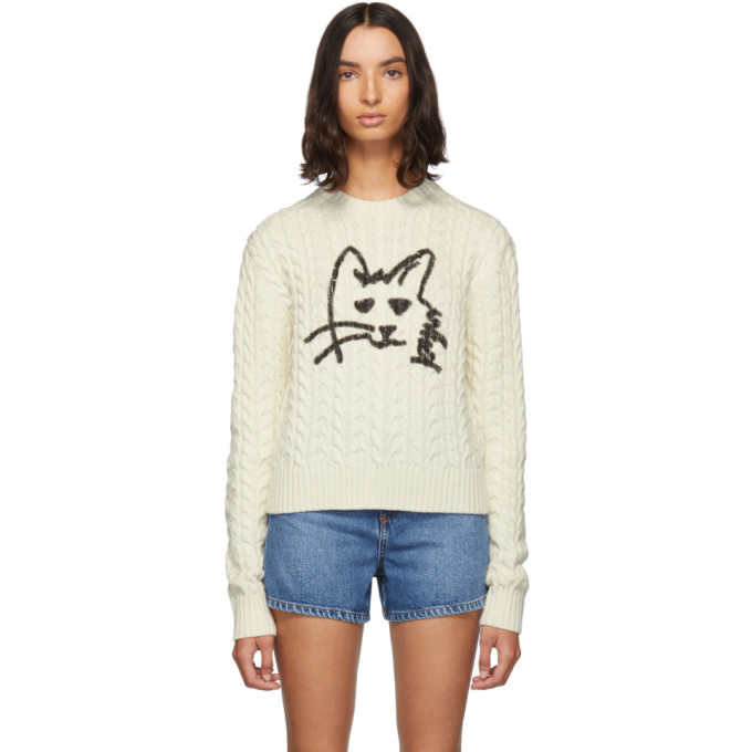 white cat sweater