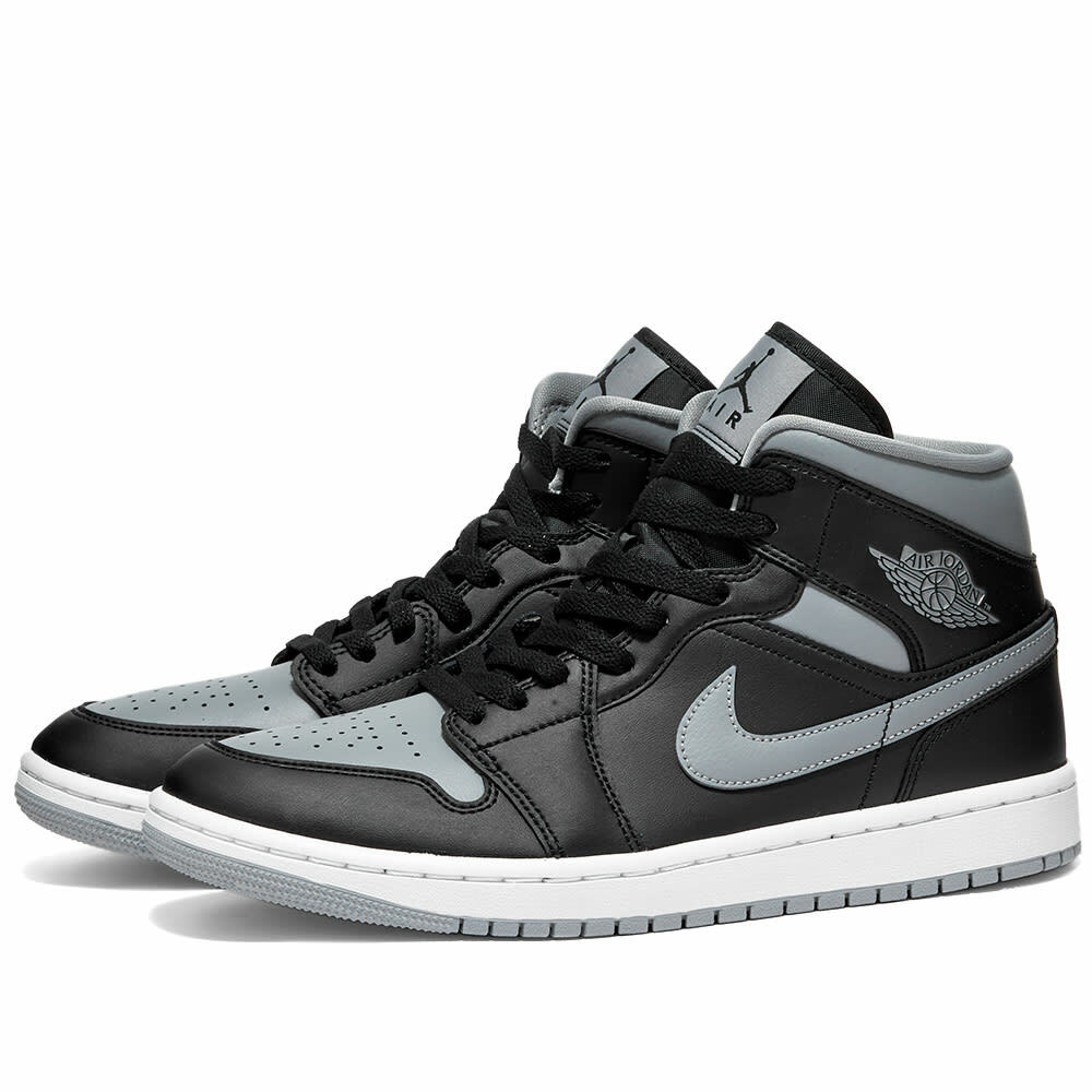 Air Jordan Women's 1 Mid Sneakers in Black/Particle Grey/White Nike ...