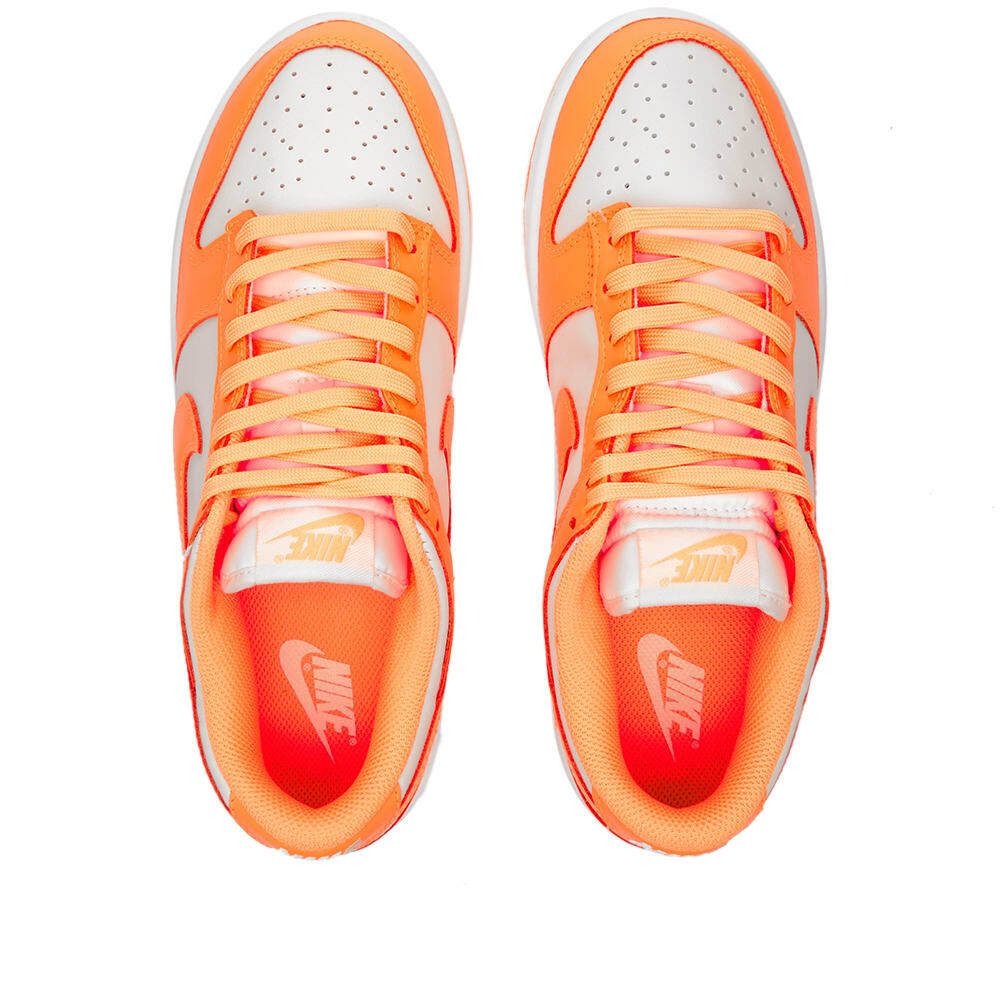 peach color nike shoes