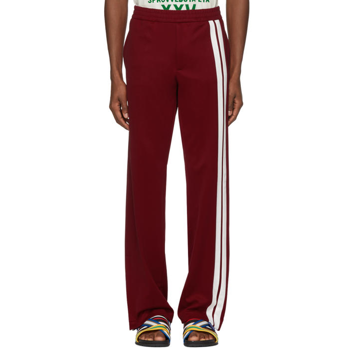 red sweatpants with white stripe