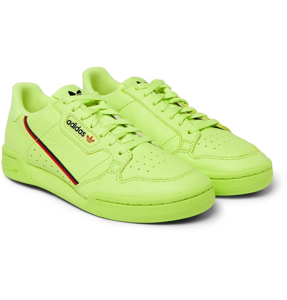neon green adidas continental