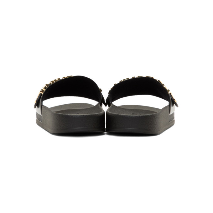 black and gold moschino slides