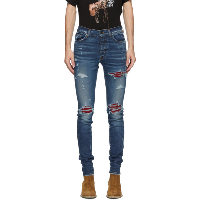 amiri jeans with red patch