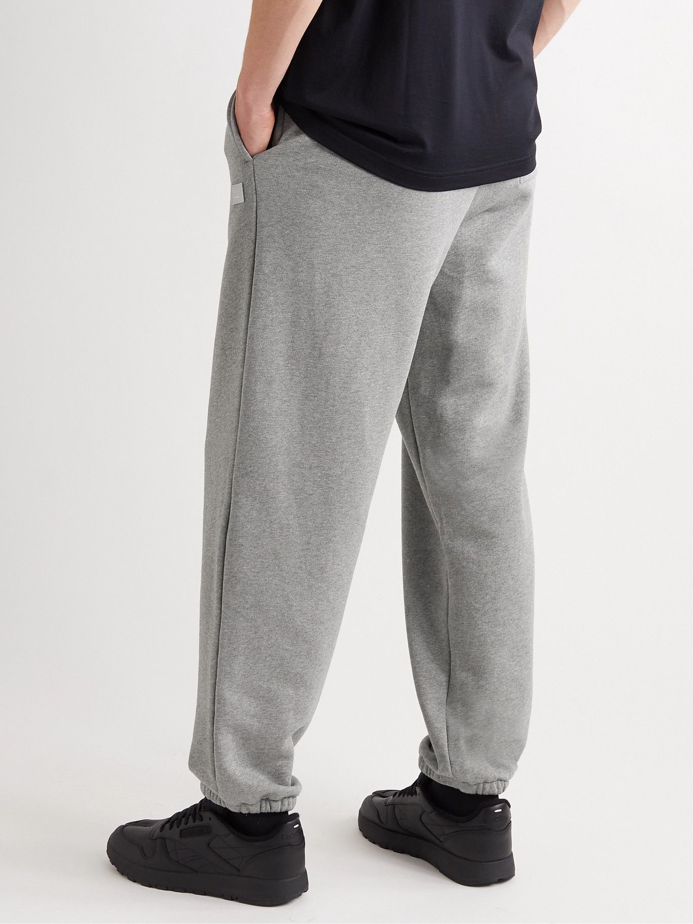 ACNE STUDIOS - Tapered Logo-Appliquéd Cotton-Jersey Sweatpants - Gray ...