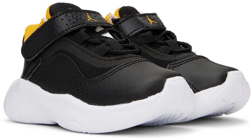 black and yellow jordans 11