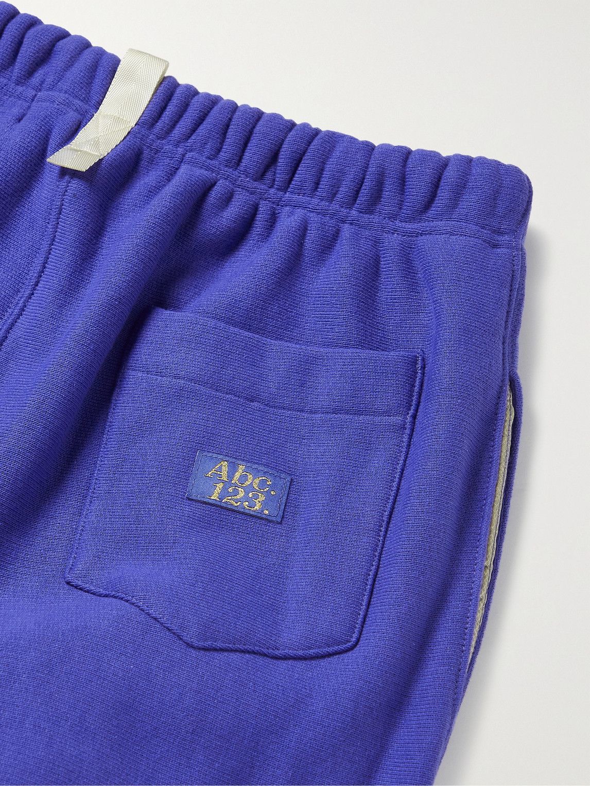 Abc. 123. - Tapered Logo-Appliquéd Cotton-Jersey Sweatpants - Blue ...