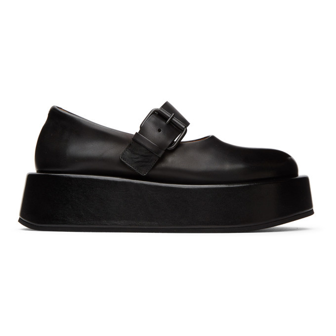 black platform buckle shoes