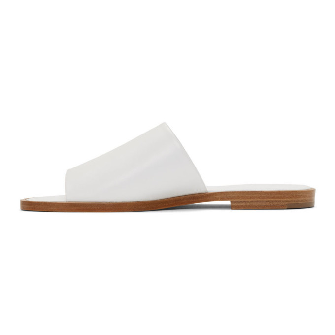 white flat slip on sandals