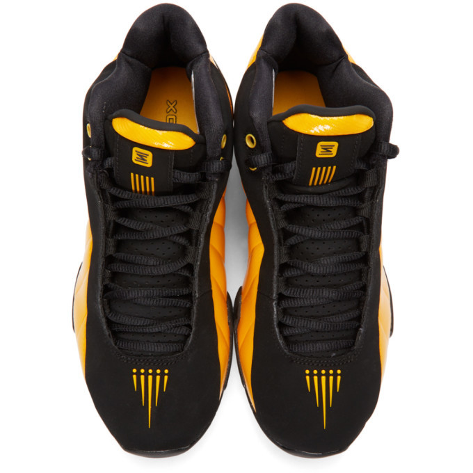 black and yellow nike shox