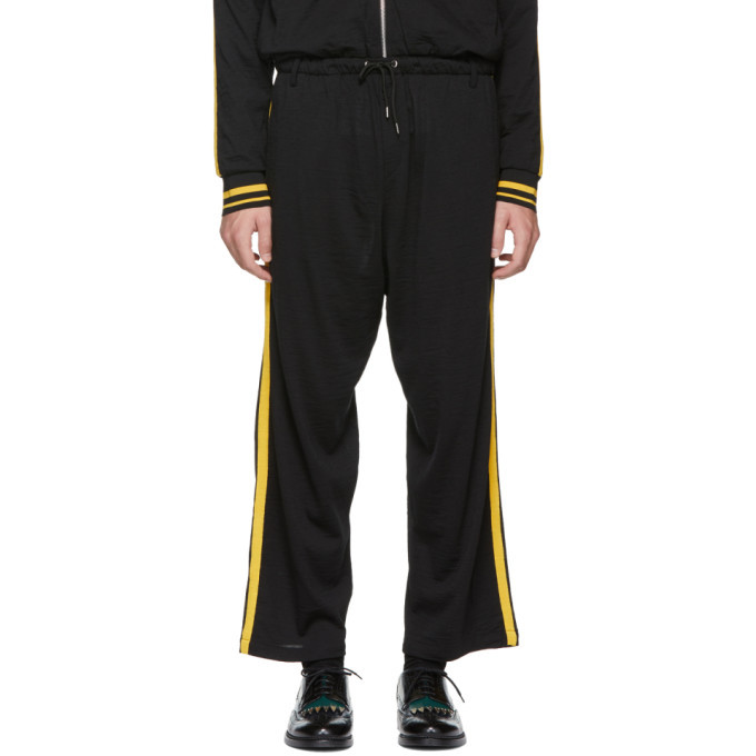 black pants with yellow side stripe