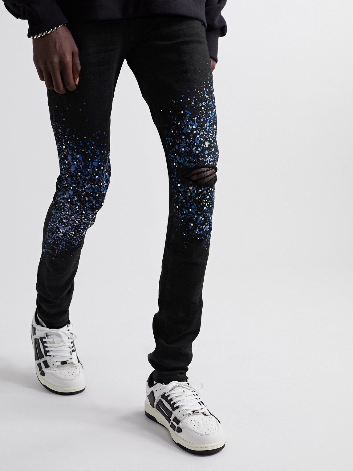black amiri paint splatter jeans