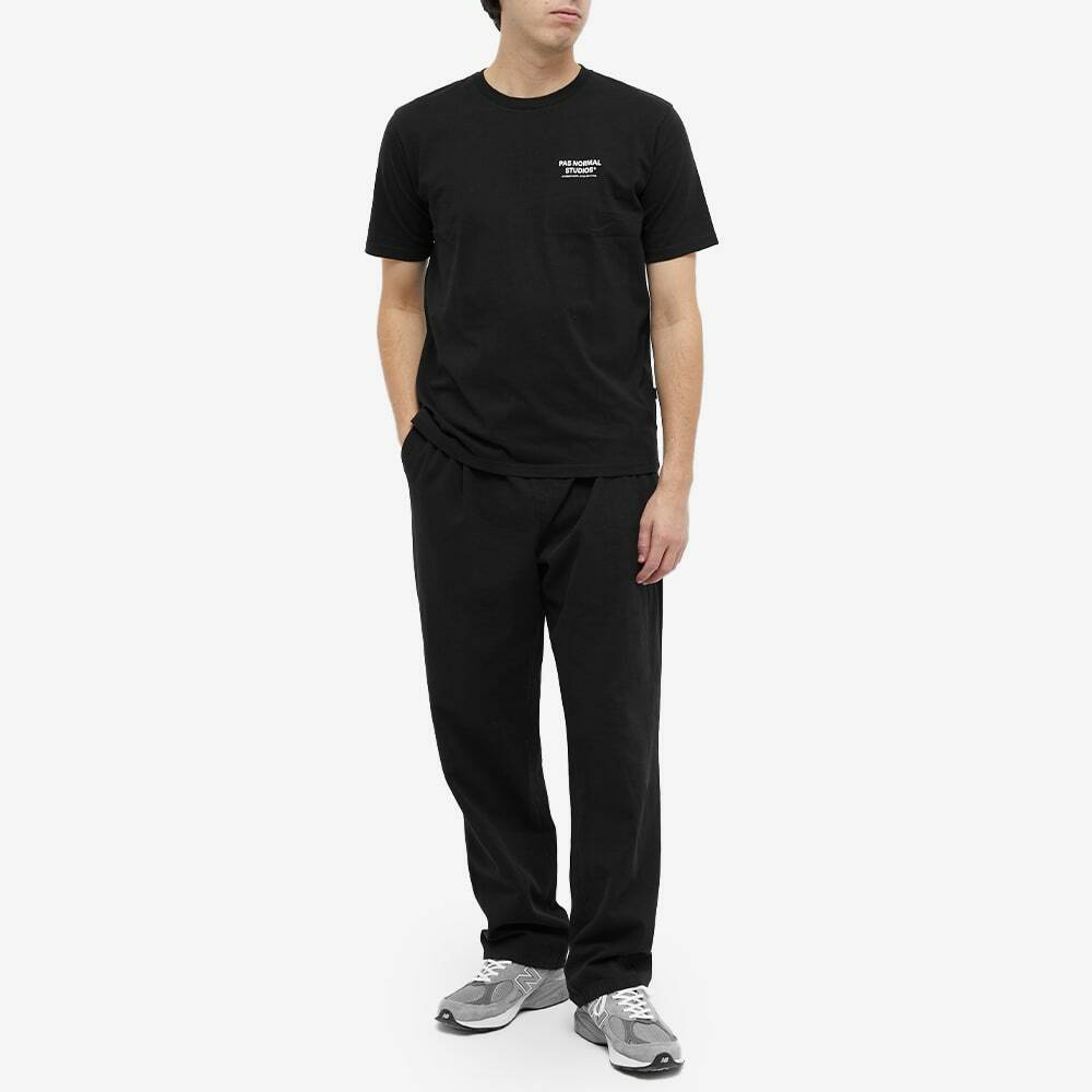 Pas Normal Studios Men's Off-Race PNS T-Shirt in Black Pas Normal Studios