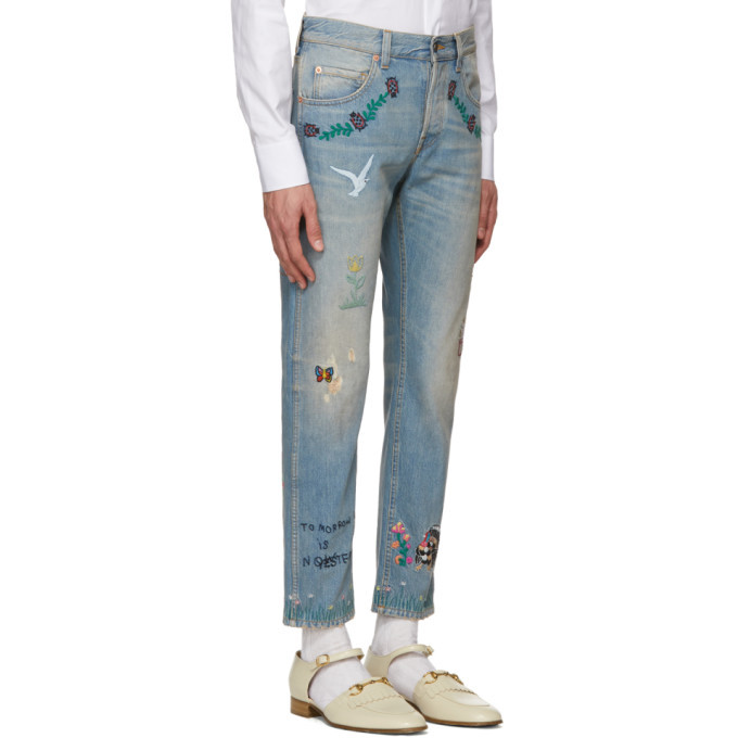 gucci jeans with writing